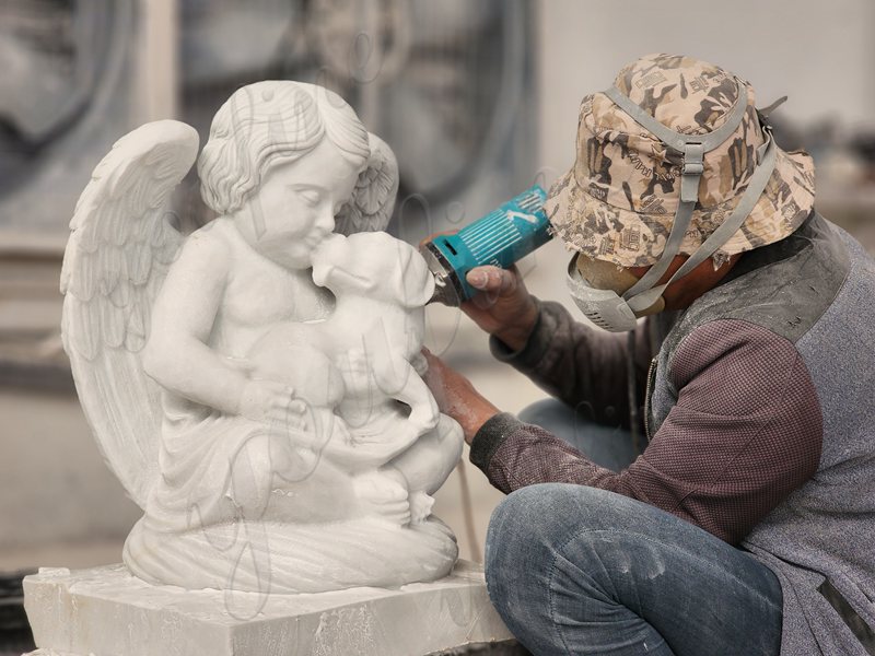 carving beautiful angel statue